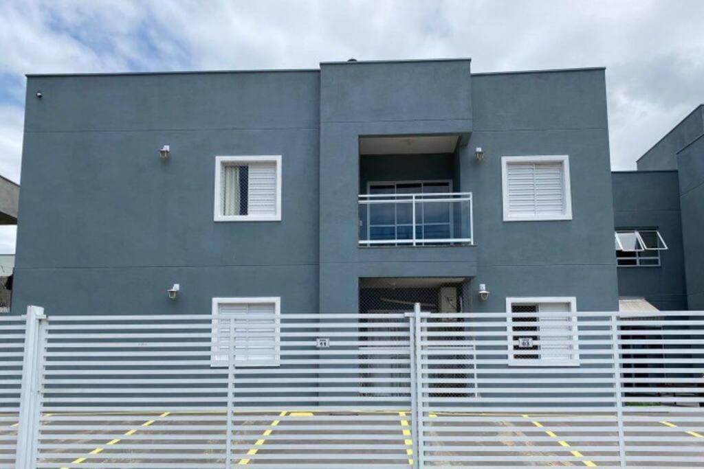 Em